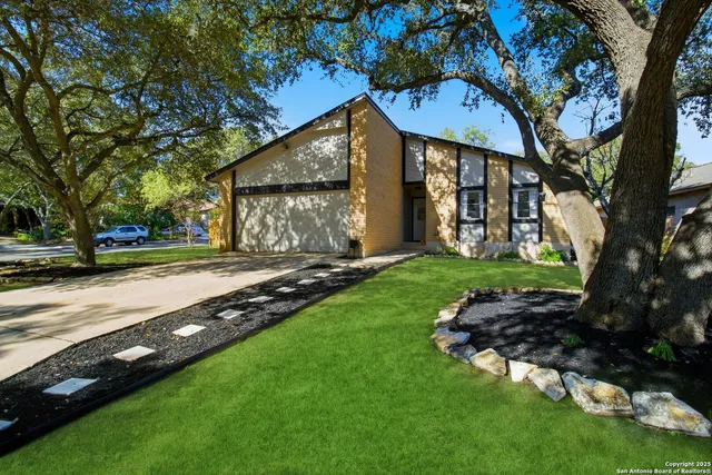 a view of a house with a park