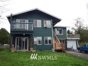 146 Sheridan Road Bremerton, WA 98310 - Photo 1 of 1 a front view of a house with a yard