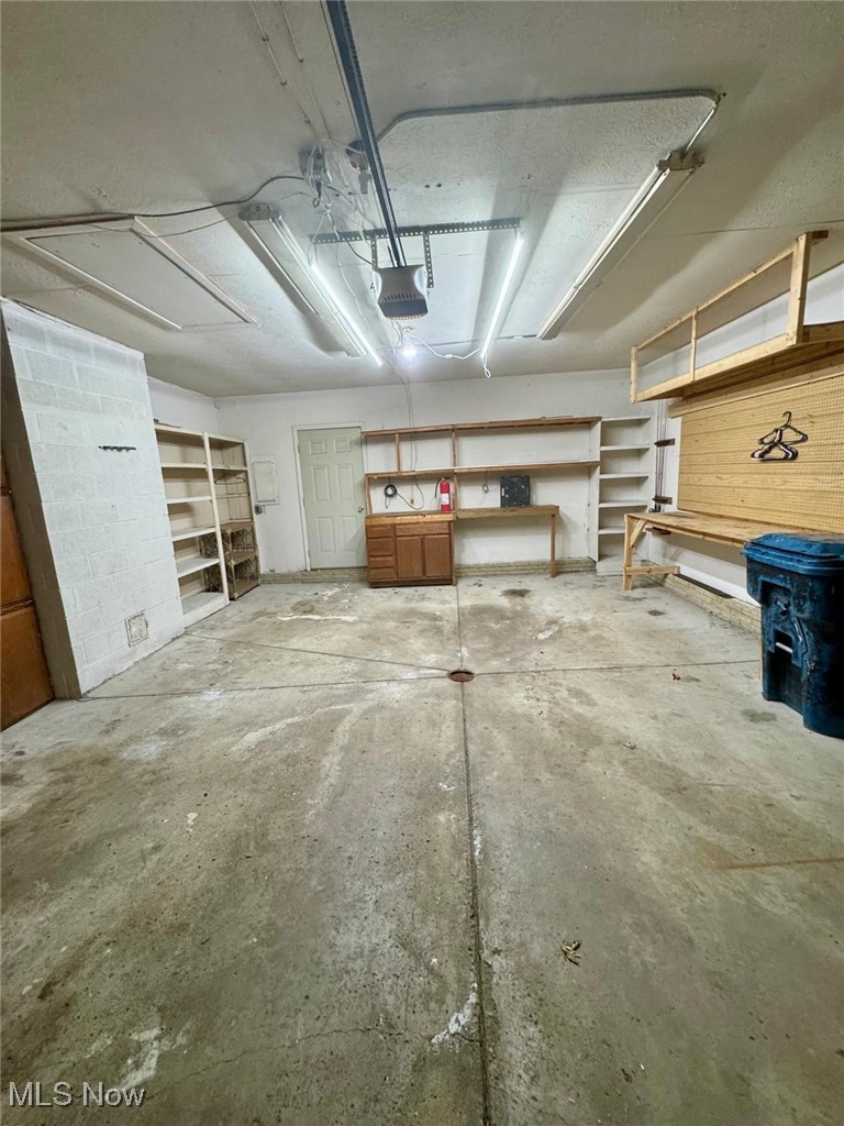 17073 Drake Road Strongsville, OH 44136 - Photo 46 of 50 Garage featuring a garage door opener