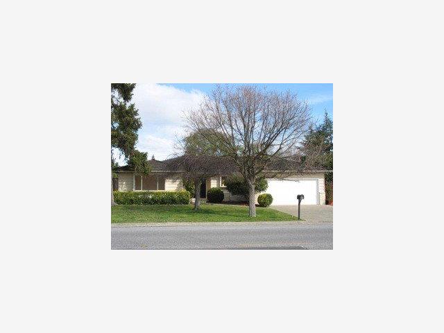 1171 Covington Road Los Altos, CA 94024 - Photo 1 of 9 a picture of a person on a street