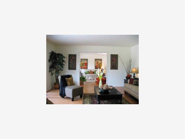 1171 Covington Road Los Altos, CA 94024 - Photo 2 of 9 a living room with furniture and a window
