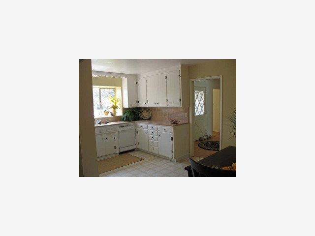 1171 Covington Road Los Altos, CA 94024 - Photo 6 of 9 a en suite bathroom with a sink double vanity and a mirror