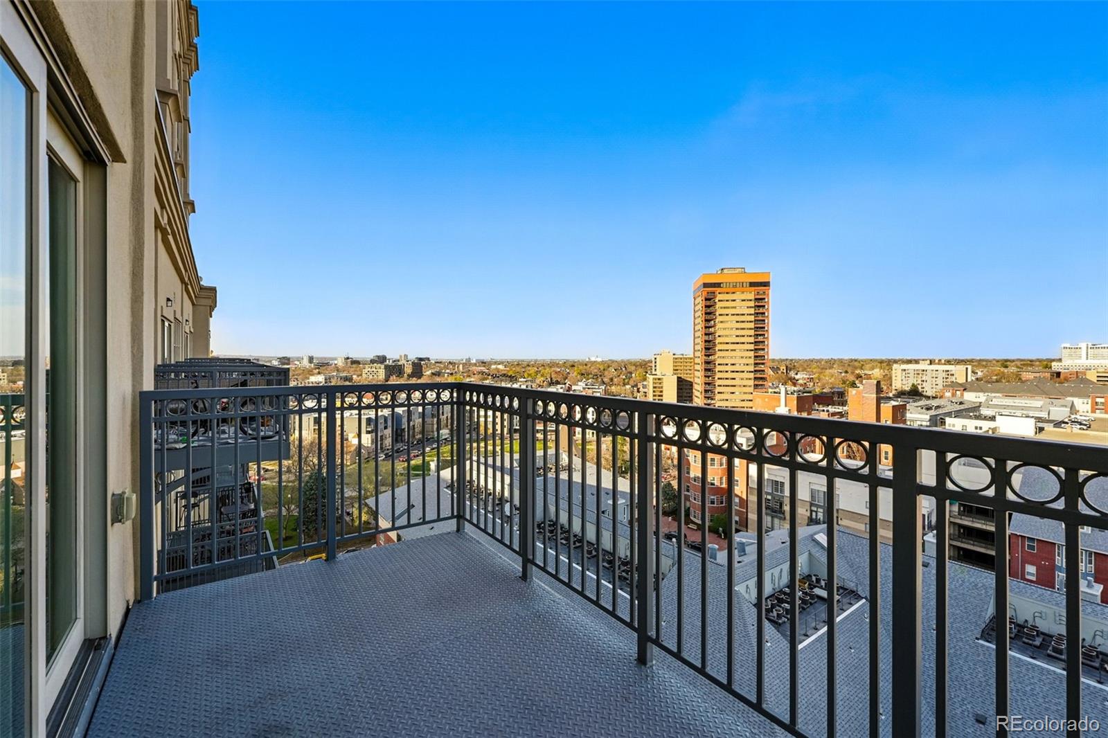 1950 Logan Street, Unit 1109 Denver, CO 80203 - Photo 16 of 49 a view of a balcony with city