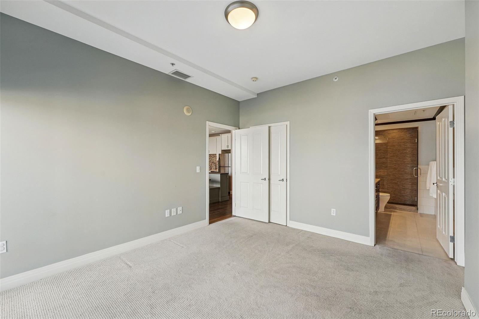 1950 Logan Street, Unit 1109 Denver, CO 80203 - Photo 29 of 49 a view of an empty room