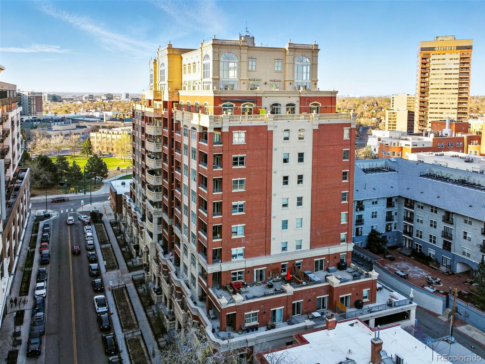 1950 Logan Street, Unit 1109 Denver, CO 80203 - Photo 33 of 49 a city view with tall buildings