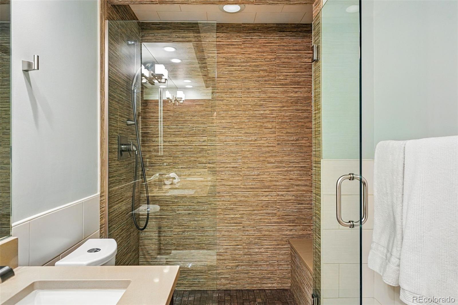 1950 Logan Street, Unit 1109 Denver, CO 80203 - Photo 34 of 49 a bathroom with a shower