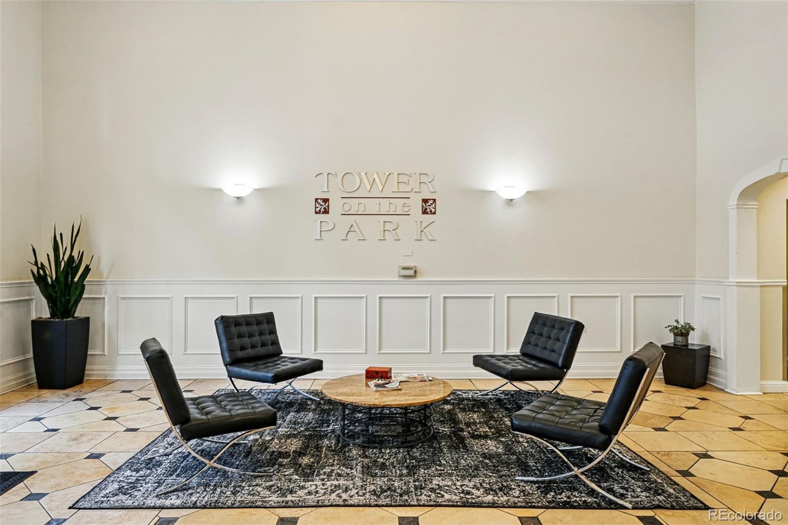 1950 Logan Street, Unit 1109 Denver, CO 80203 - Photo 38 of 49 a backyard of a house with furniture and a table