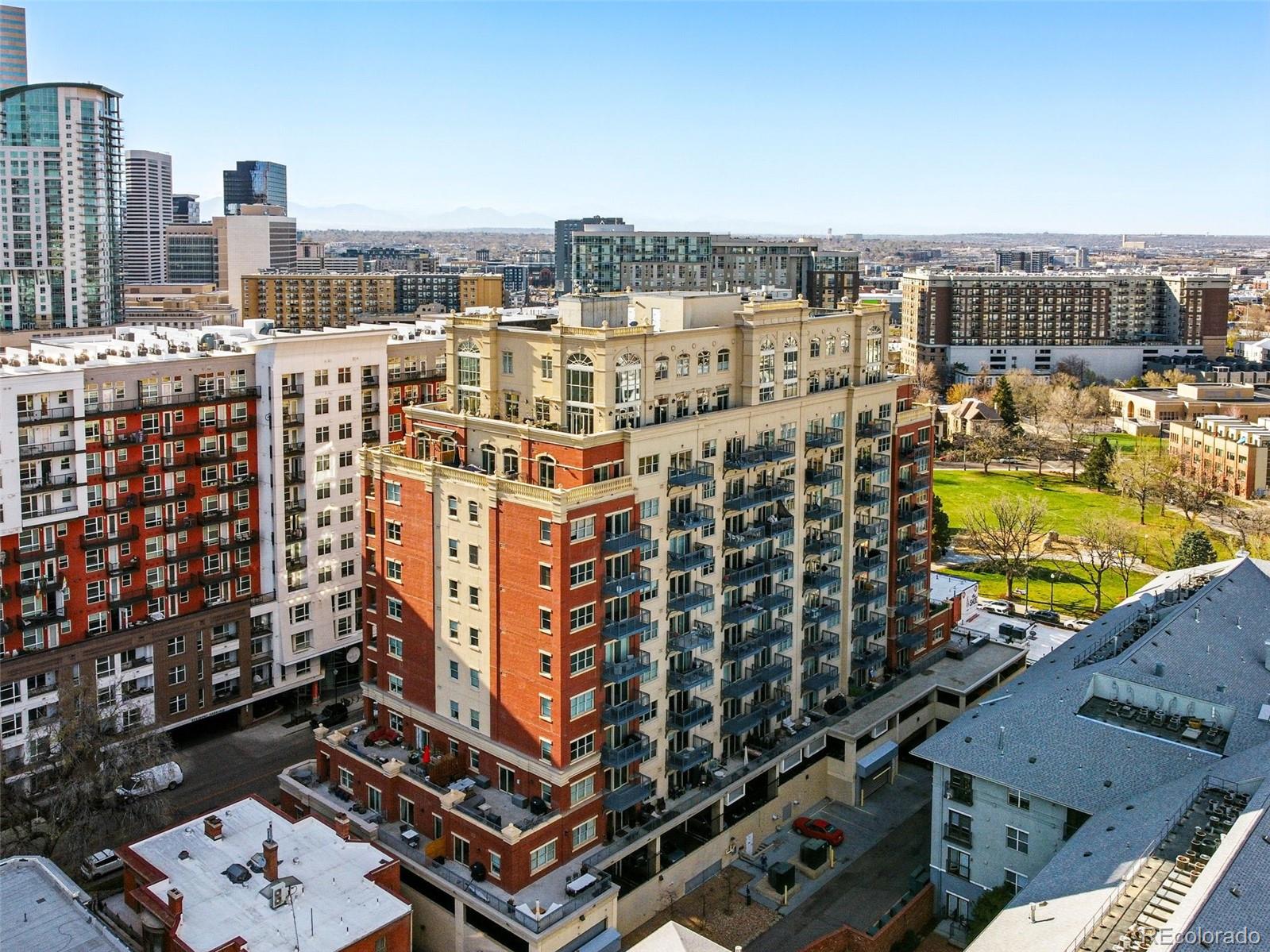 1950 Logan Street, Unit 1109 Denver, CO 80203 - Photo 39 of 49 a view of a city with tall buildings