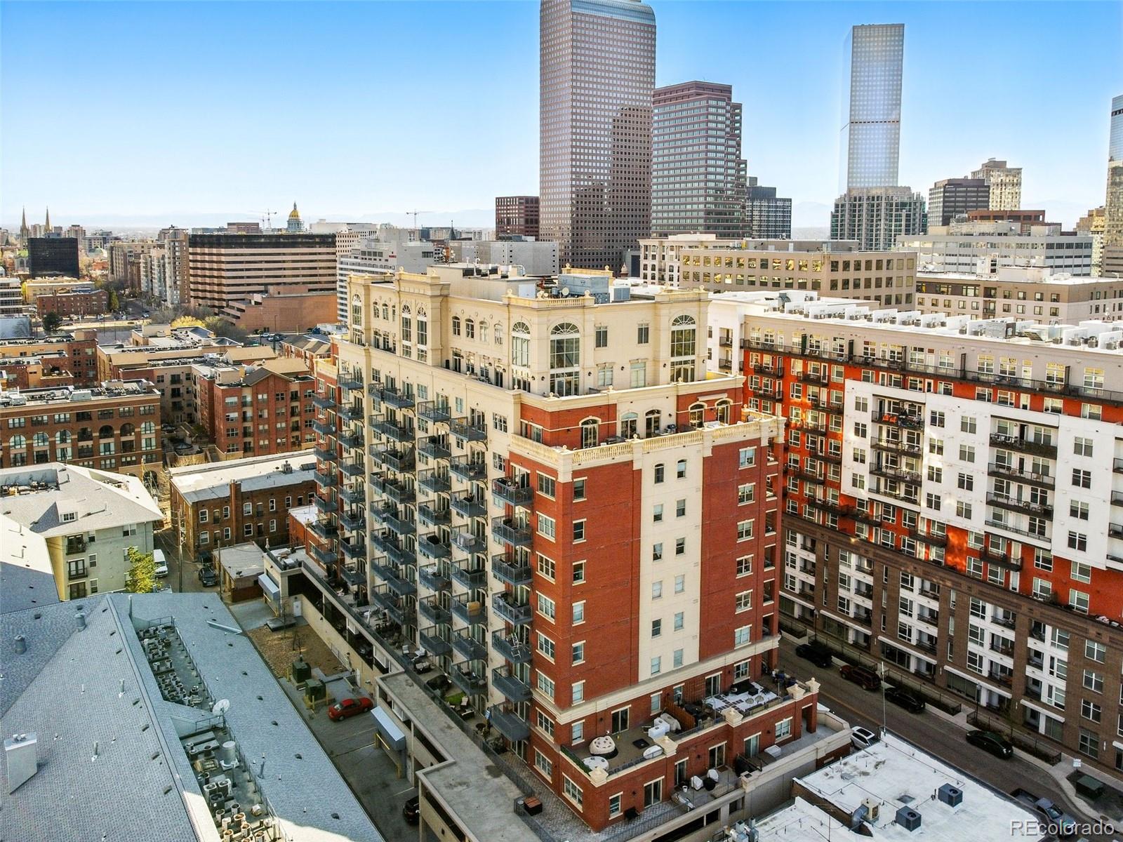 1950 Logan Street, Unit 1109 Denver, CO 80203 - Photo 40 of 49 a view of city with tall buildings