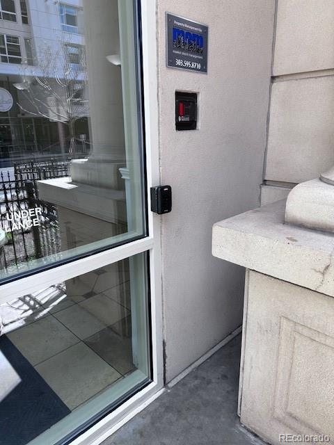 1950 Logan Street, Unit 1109 Denver, CO 80203 - Photo 44 of 49 a bathroom with a toilet and a sink