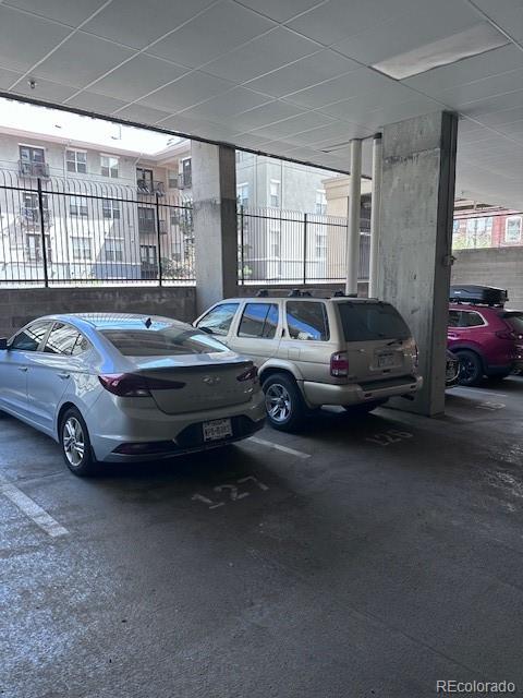 1950 Logan Street, Unit 1109 Denver, CO 80203 - Photo 49 of 49 a view of a cars parked in garage