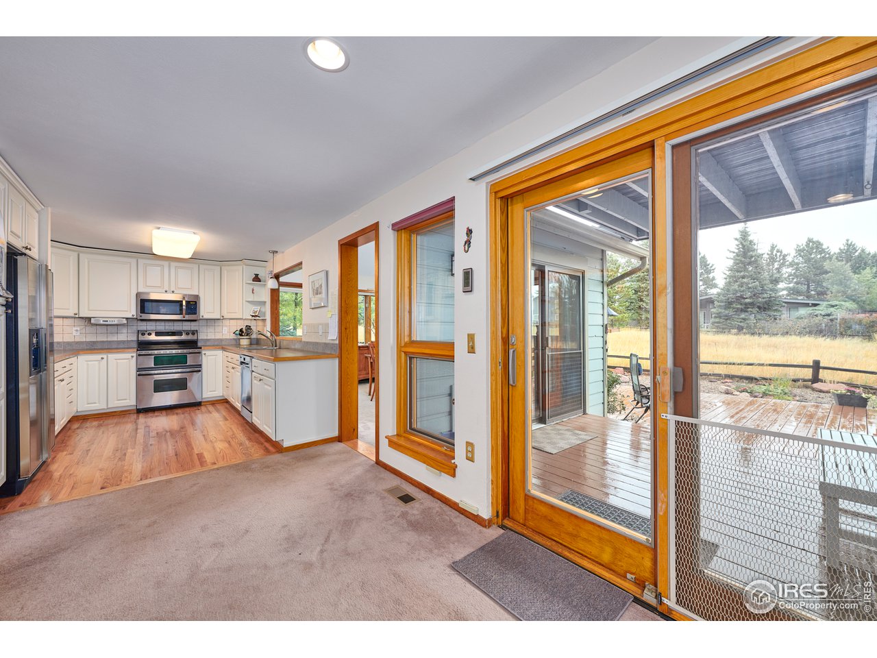 2877 Tincup Circle Boulder, CO 80305 - Photo 12 of 38 a view of kitchen with furniture and large window
