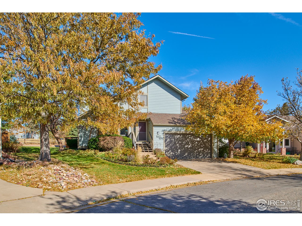 2877 Tincup Circle Boulder, CO 80305 - Photo 2 of 38 a view of a yard in front of a building