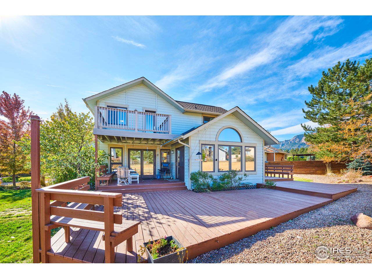 2877 Tincup Circle Boulder, CO 80305 - Photo 4 of 38 a front view of a house with garden
