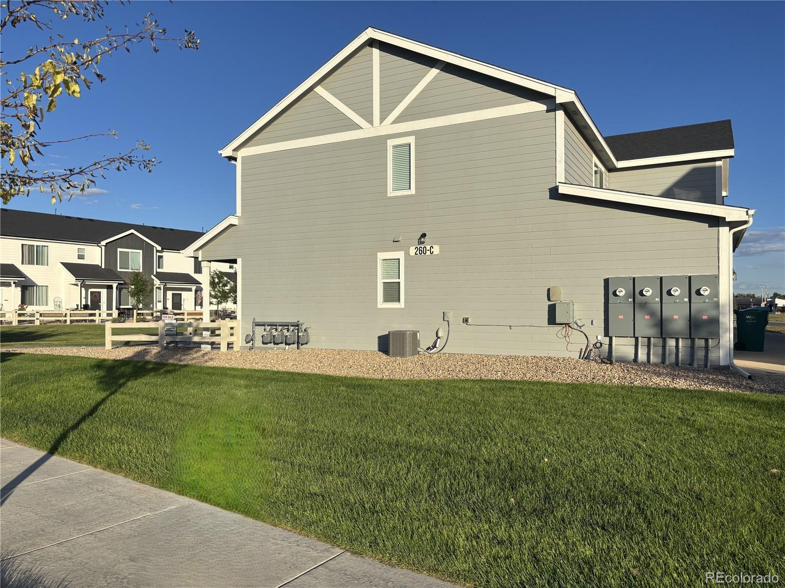 260 Pawnee Road, Unit C1 Ault, CO 80610 - Photo 14 of 14 a front view of a house with a yard