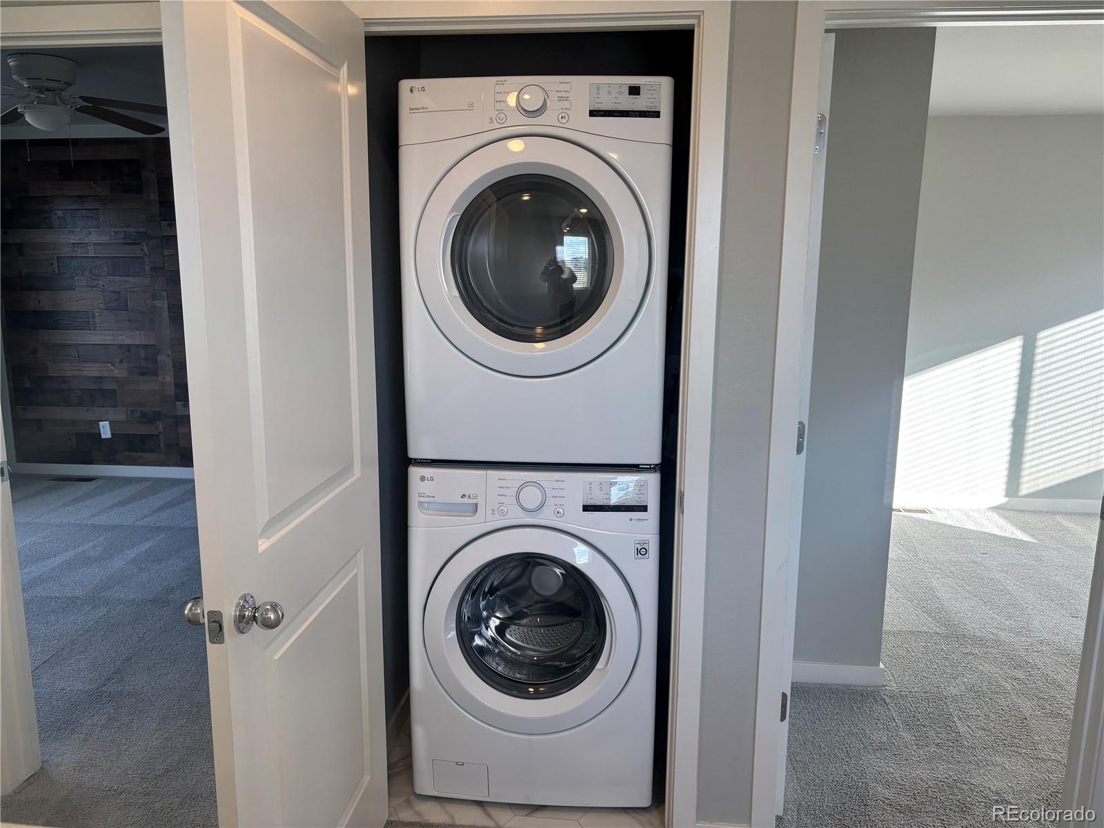 260 Pawnee Road, Unit C1 Ault, CO 80610 - Photo 7 of 14 a utility room with dryer and washer