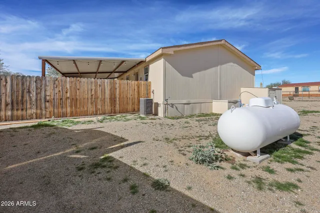 a view of a backyard of a house