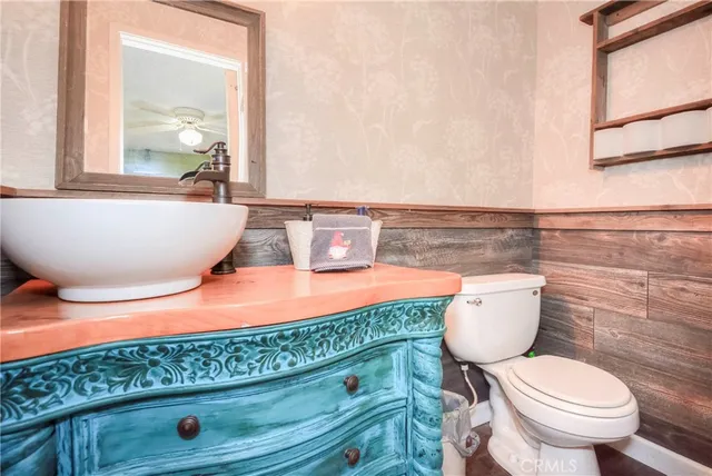 a room with a sink and a toilet