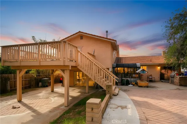 a view of a balcony with car parked