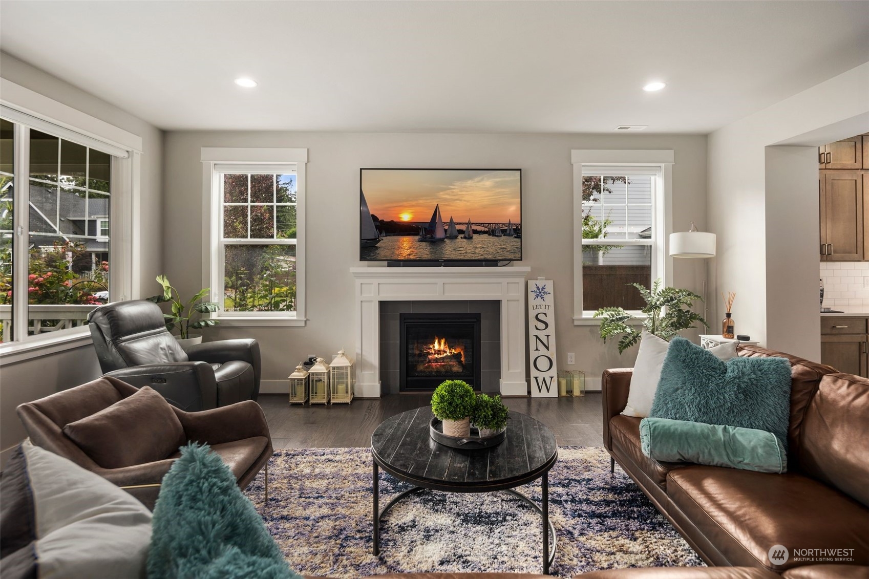16025 Southeast 144th Street Renton, WA 98059 - Photo 18 of 40 a living room with furniture and a fireplace