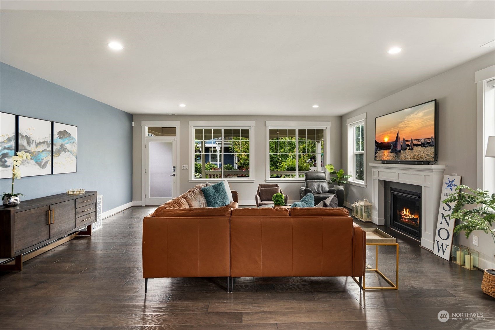 16025 Southeast 144th Street Renton, WA 98059 - Photo 19 of 40 a living room with furniture and a fireplace