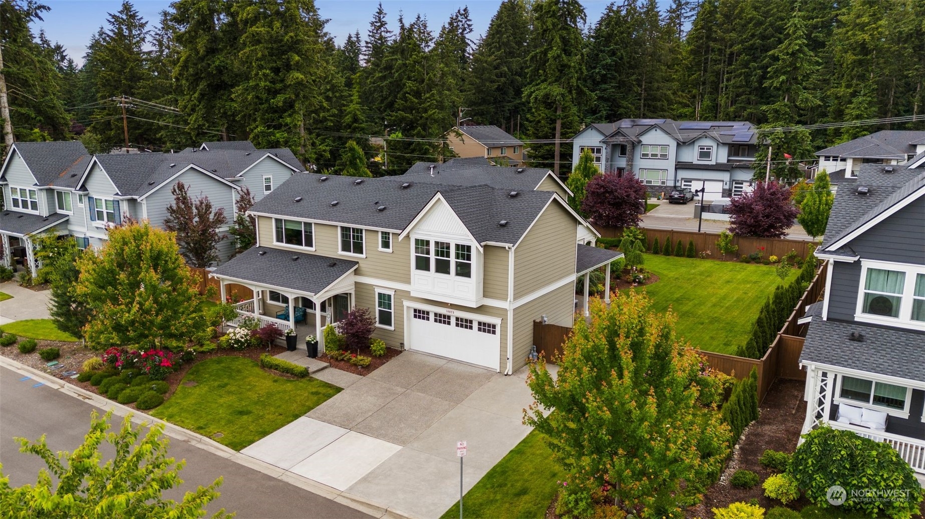 16025 Southeast 144th Street Renton, WA 98059 - Photo 2 of 40 an aerial view of a house with a garden