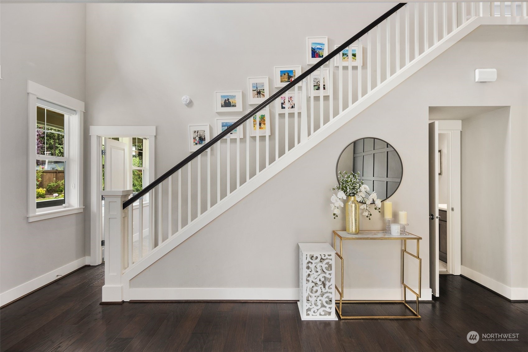 16025 Southeast 144th Street Renton, WA 98059 - Photo 29 of 40 a view of entryway and hall with wooden floor