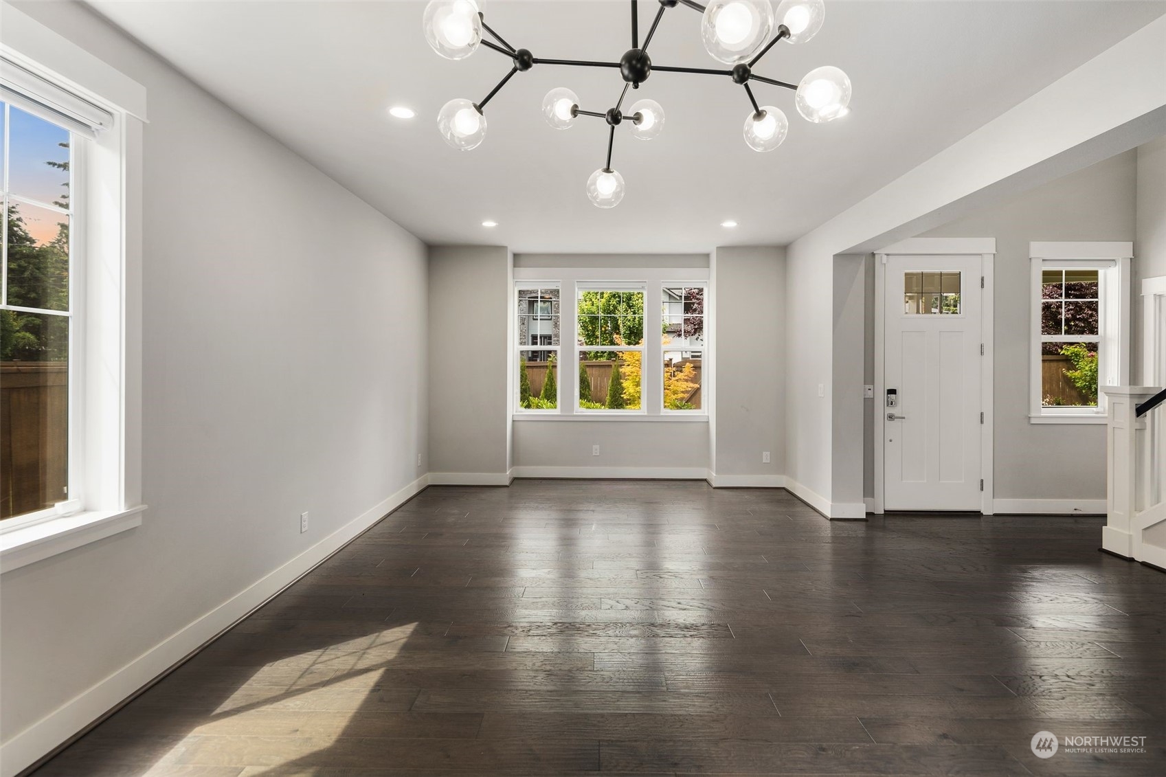 16025 Southeast 144th Street Renton, WA 98059 - Photo 30 of 40 a view of an empty room with window and wooden floor