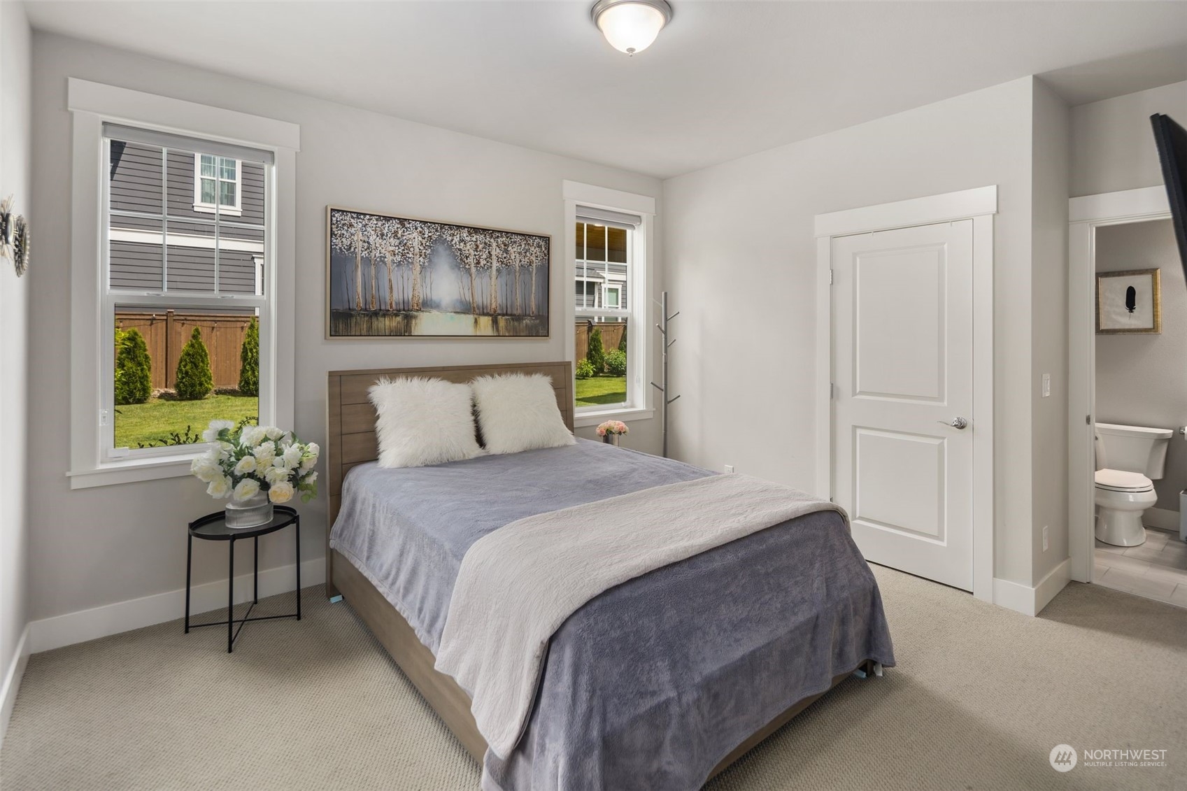 16025 Southeast 144th Street Renton, WA 98059 - Photo 32 of 40 a bedroom with a large bed and a window