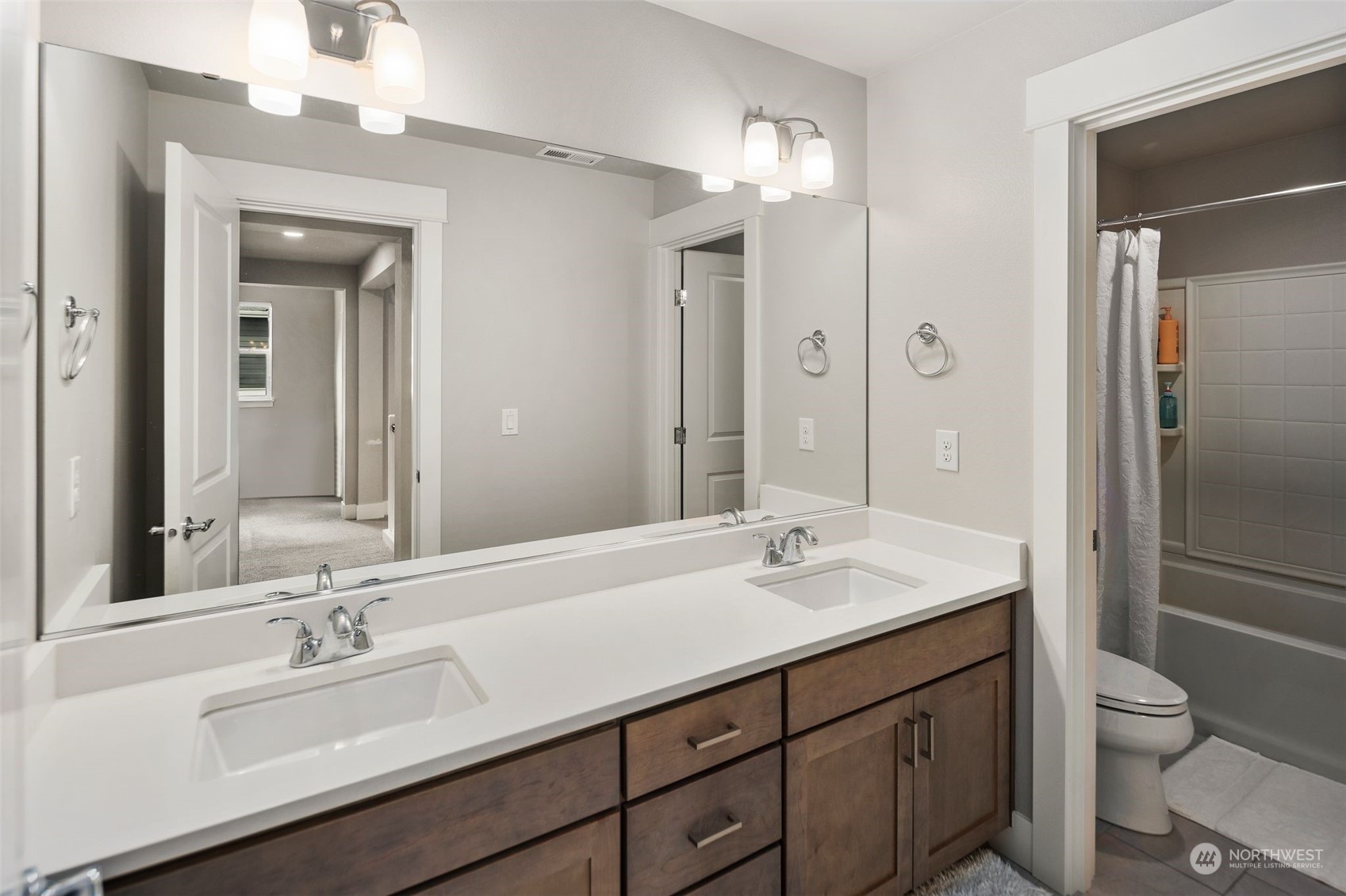 16025 Southeast 144th Street Renton, WA 98059 - Photo 37 of 40 a bathroom with a sink a toilet and shower