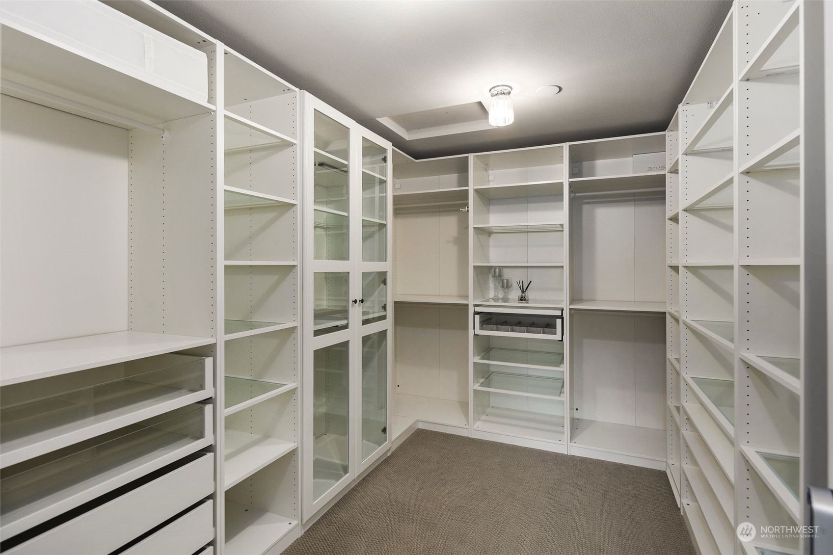 16025 Southeast 144th Street Renton, WA 98059 - Photo 38 of 40 a view of walk in closet with empty racks