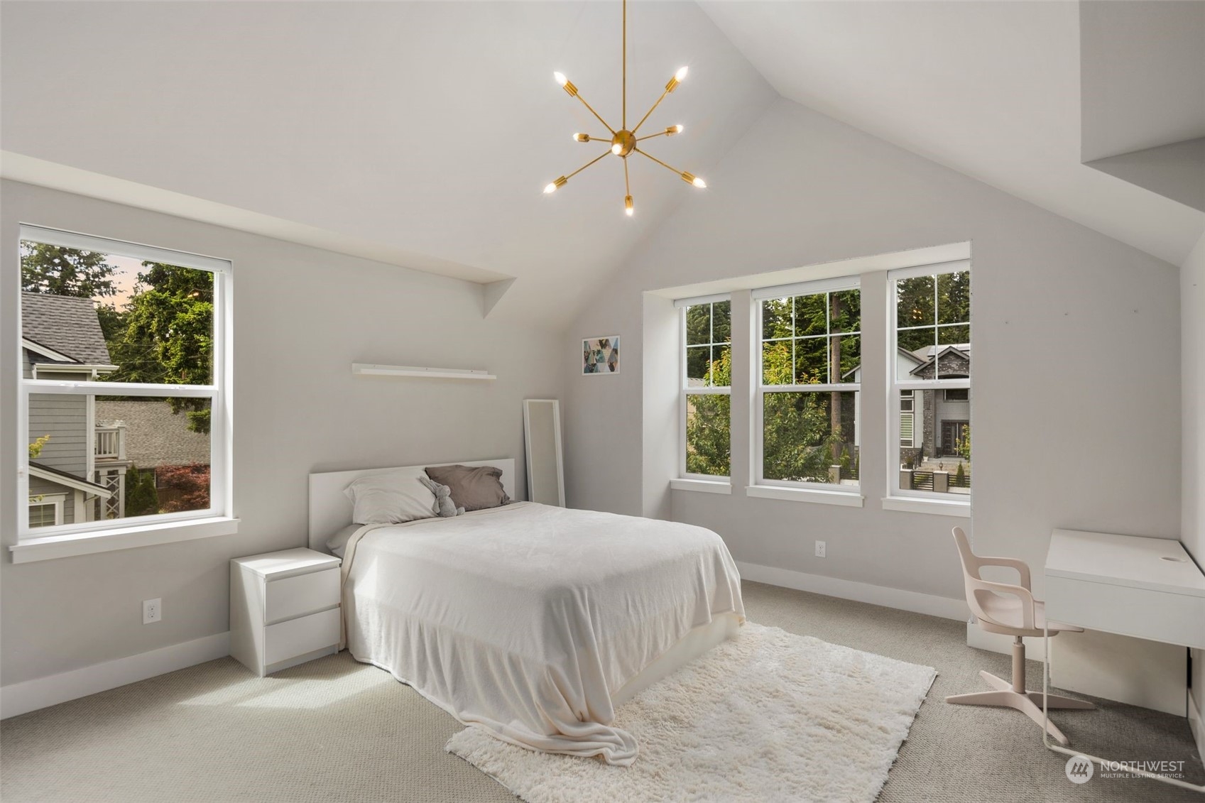 16025 Southeast 144th Street Renton, WA 98059 - Photo 39 of 40 a bedroom with a large bed and a window