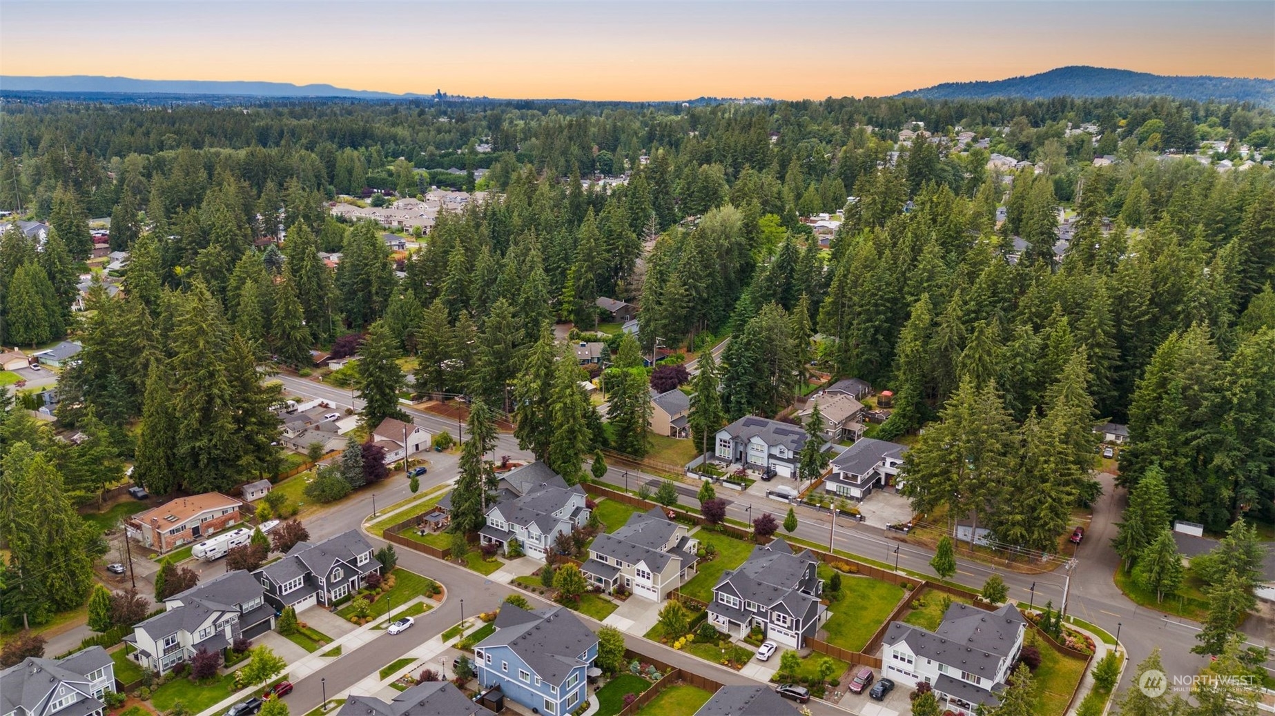 16025 Southeast 144th Street Renton, WA 98059 - Photo 9 of 40 an aerial view of a city with lots of residential buildings