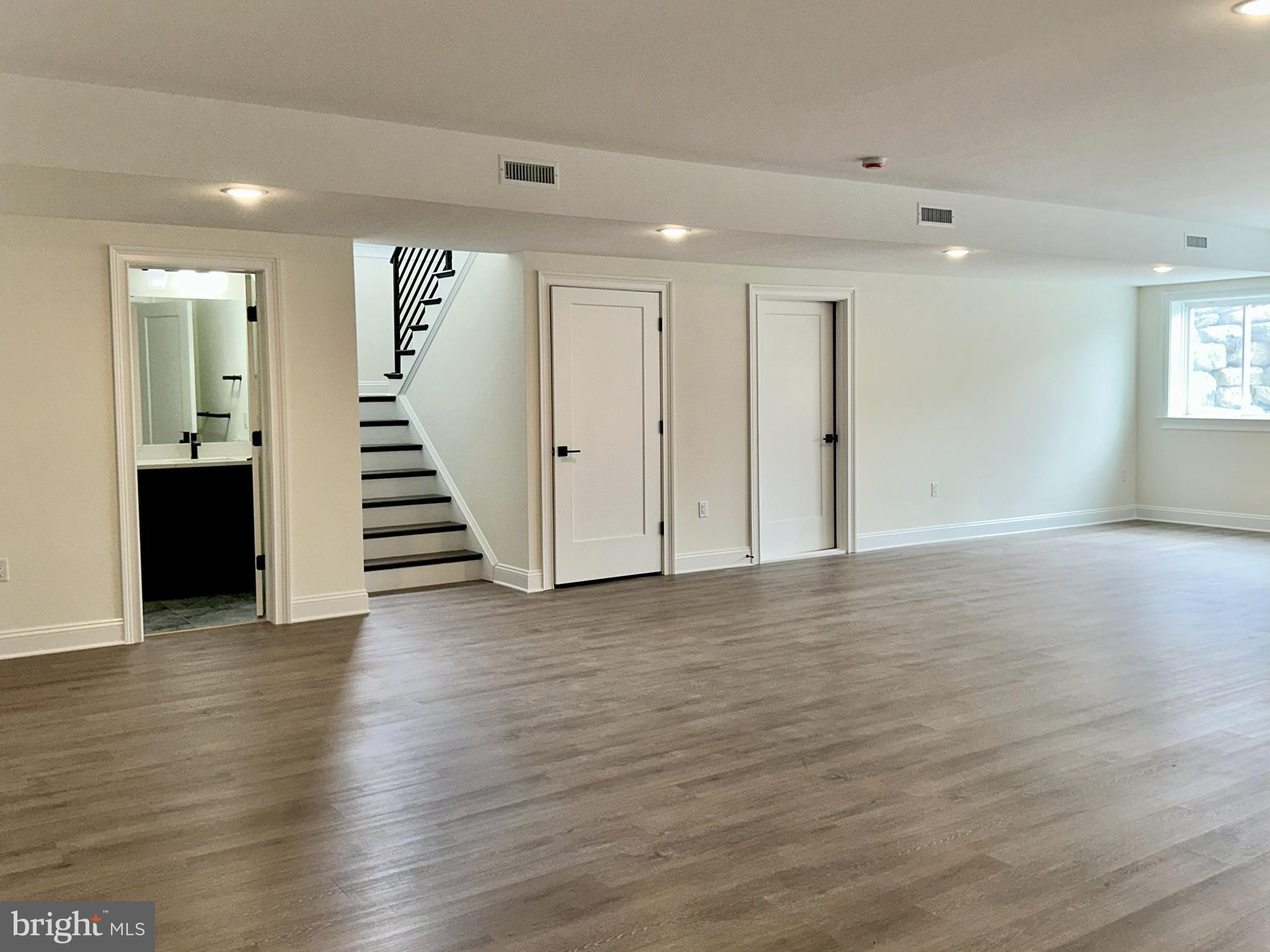 539 Sierra Lane Lancaster, PA 17601 - Photo 21 of 33 a view of a room with wooden floor and stairs