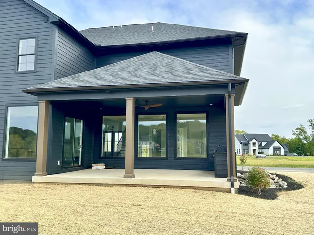 a view of a house with a swimming pool
