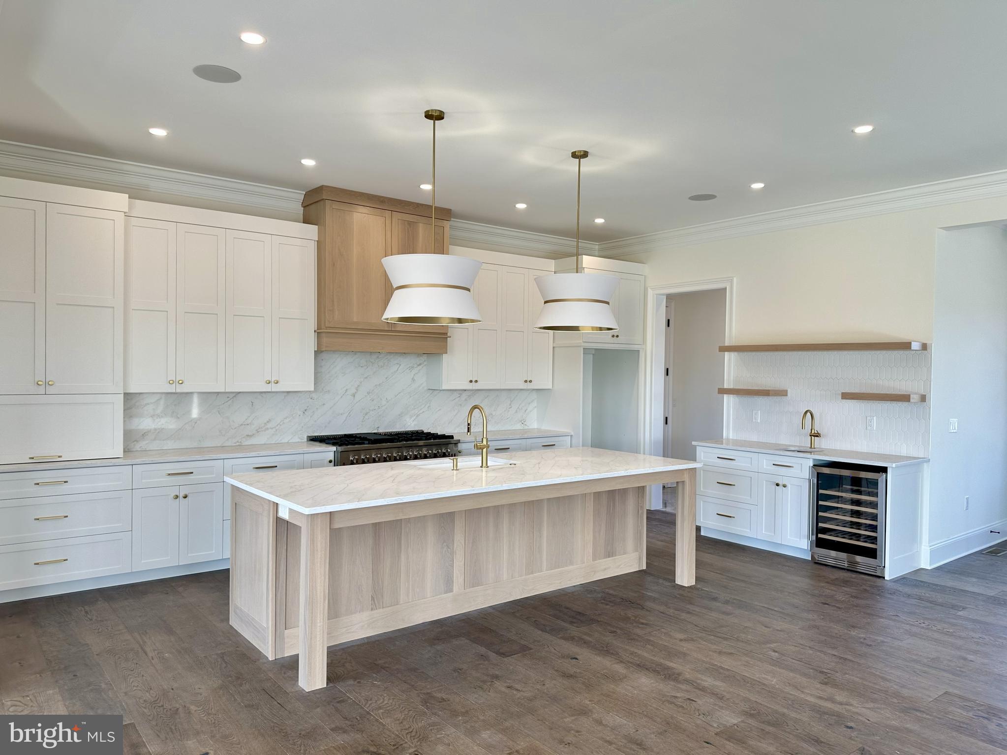 539 Sierra Lane Lancaster, PA 17601 - Photo 4 of 33 a large kitchen with cabinets and wooden floor