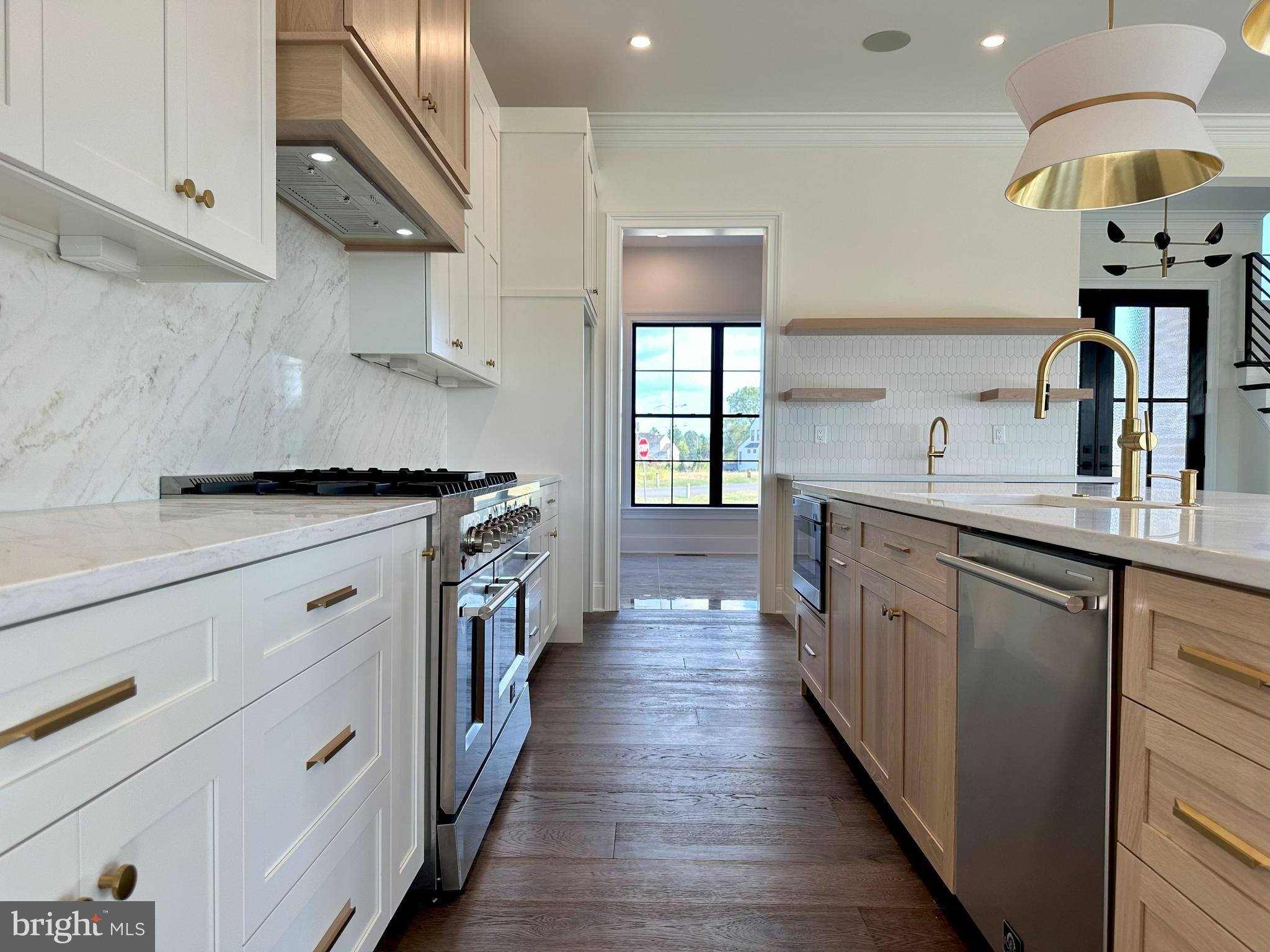 539 Sierra Lane Lancaster, PA 17601 - Photo 6 of 33 a kitchen with stainless steel appliances a sink stove and cabinets