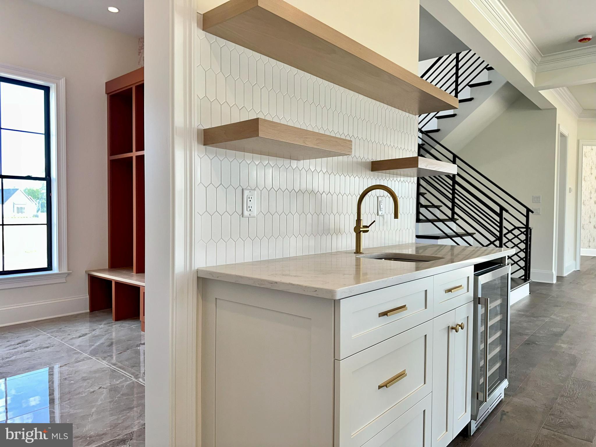 539 Sierra Lane Lancaster, PA 17601 - Photo 8 of 33 a kitchen with sink and mirror