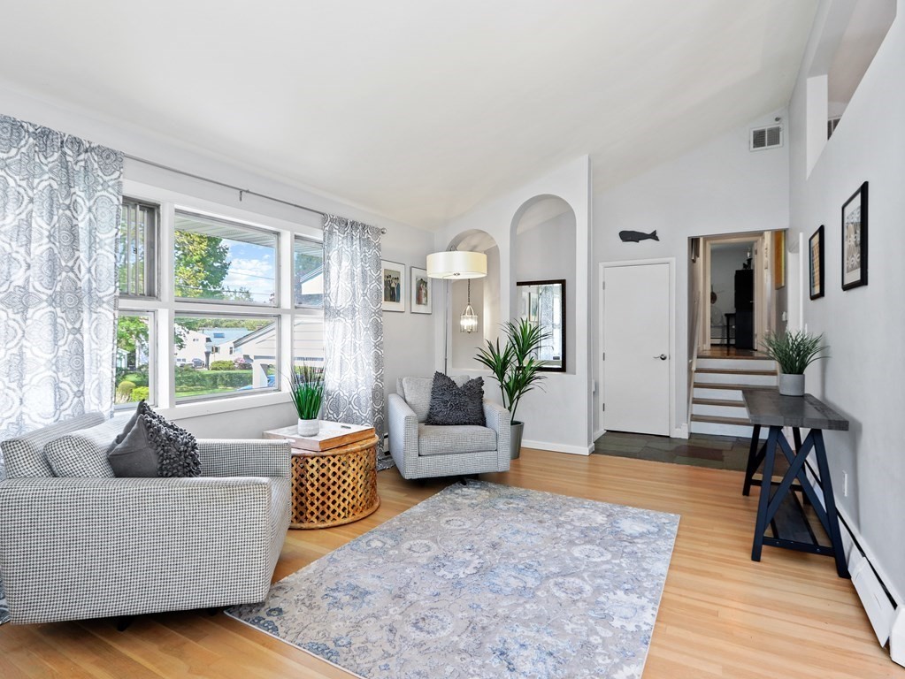 20 Woodbine Circle Needham, MA 02494 - Photo 3 of 34 a living room with furniture and a large window