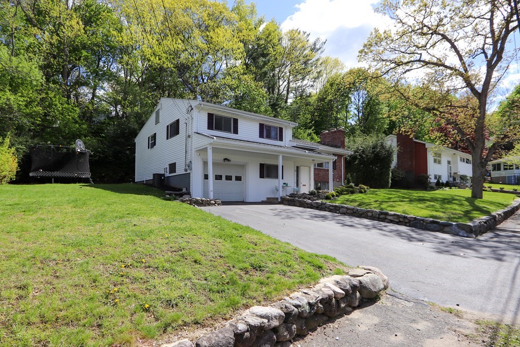 20 Woodbine Circle Needham, MA 02494 - Photo 33 of 34 a front view of a house with garden
