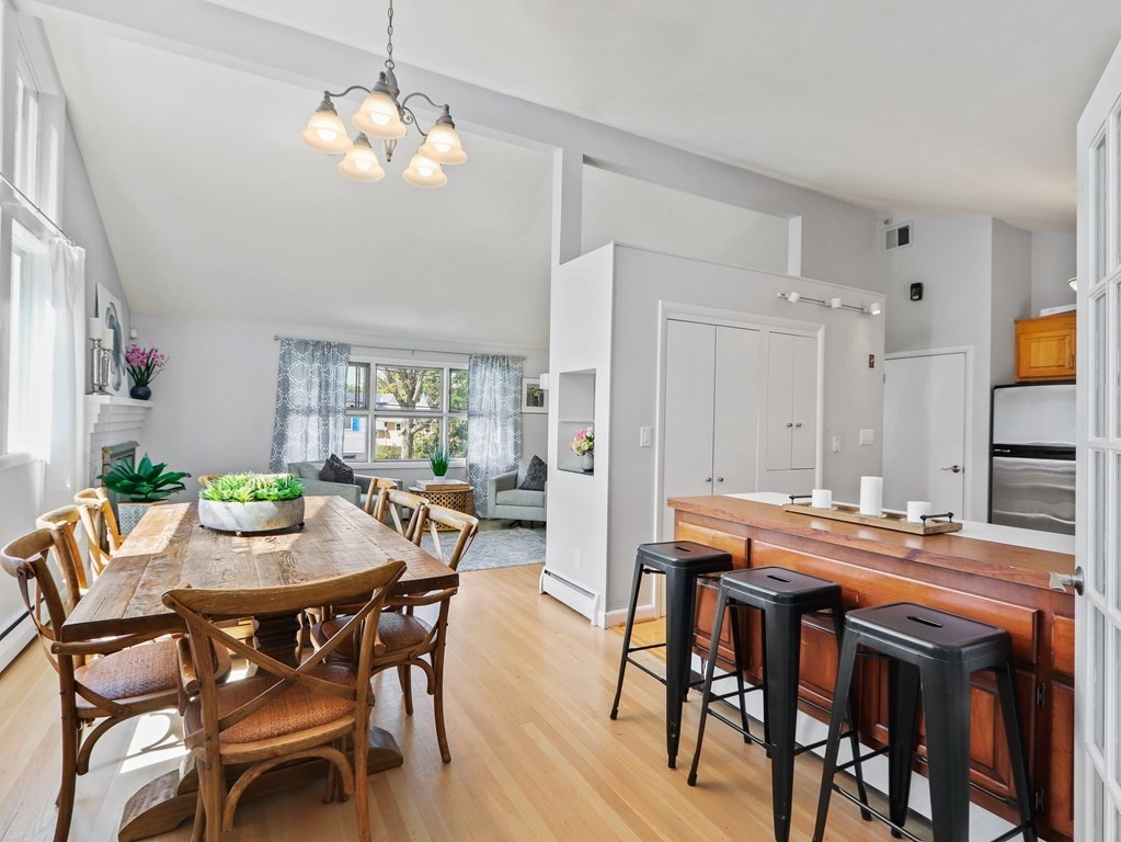 20 Woodbine Circle Needham, MA 02494 - Photo 6 of 34 a view of a dining room with furniture and wooden floor