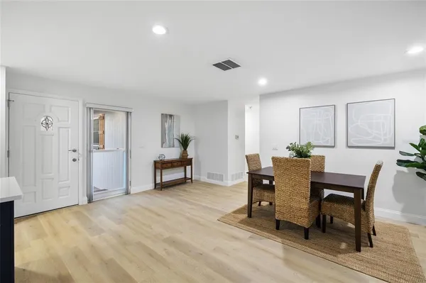a view of a livingroom with furniture and window