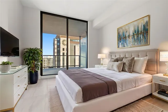 a kitchen that has a sink and a stove in it