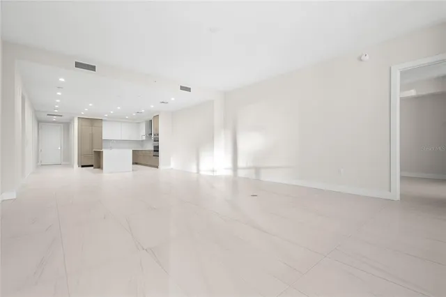 a view of a swimming pool with a lounge chair