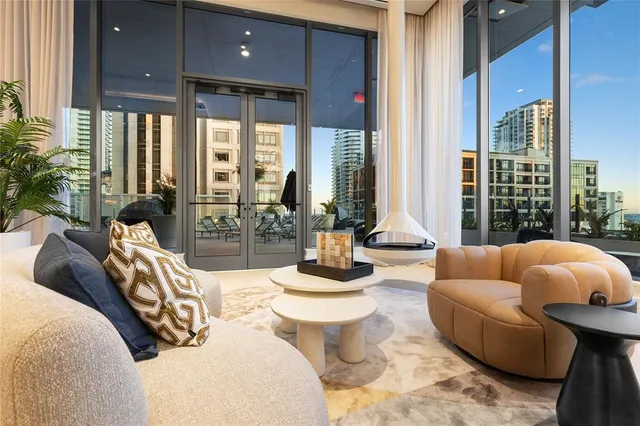 a view of balcony with floor to ceiling windows