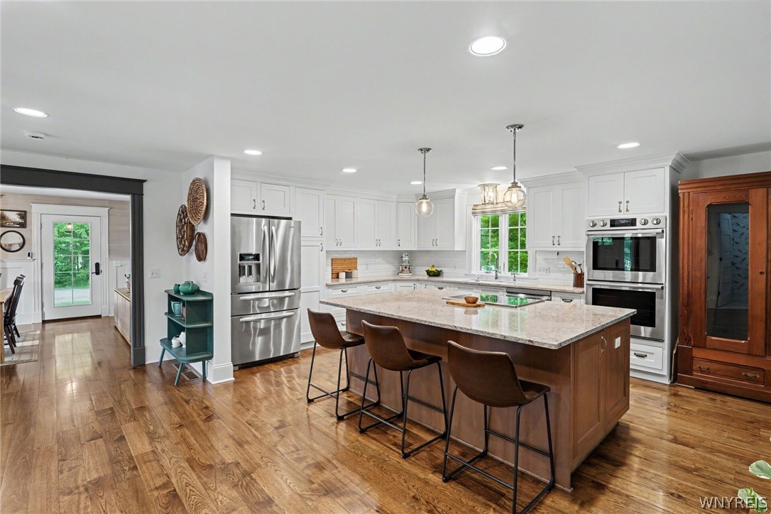 6600 Dye Road Newstead, NY 14001 - Photo 23 of 50 Center island w/ hickory floors throughout