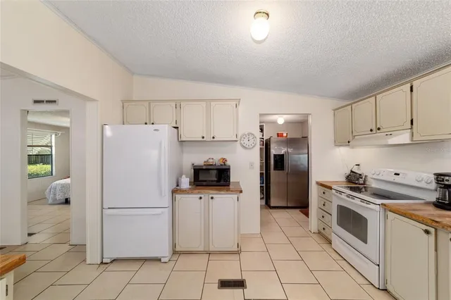 a work room with furniture and a window