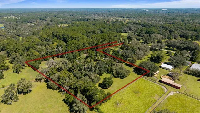 a view of a house with a yard porch and sitting area