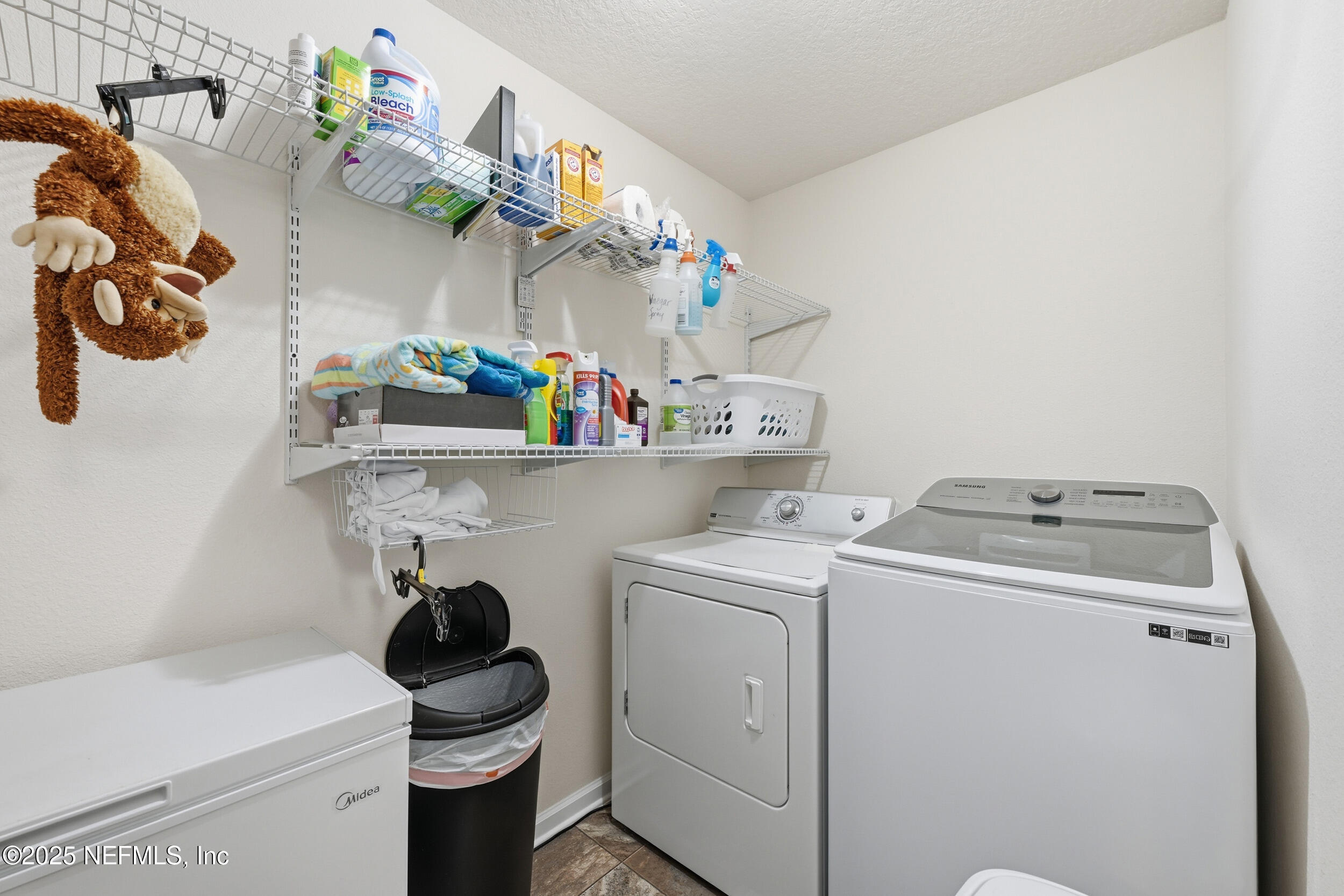 4068 Great Falls Loop Middleburg, FL 32068 - Photo 23 of 36 a utility room with dryer and washer