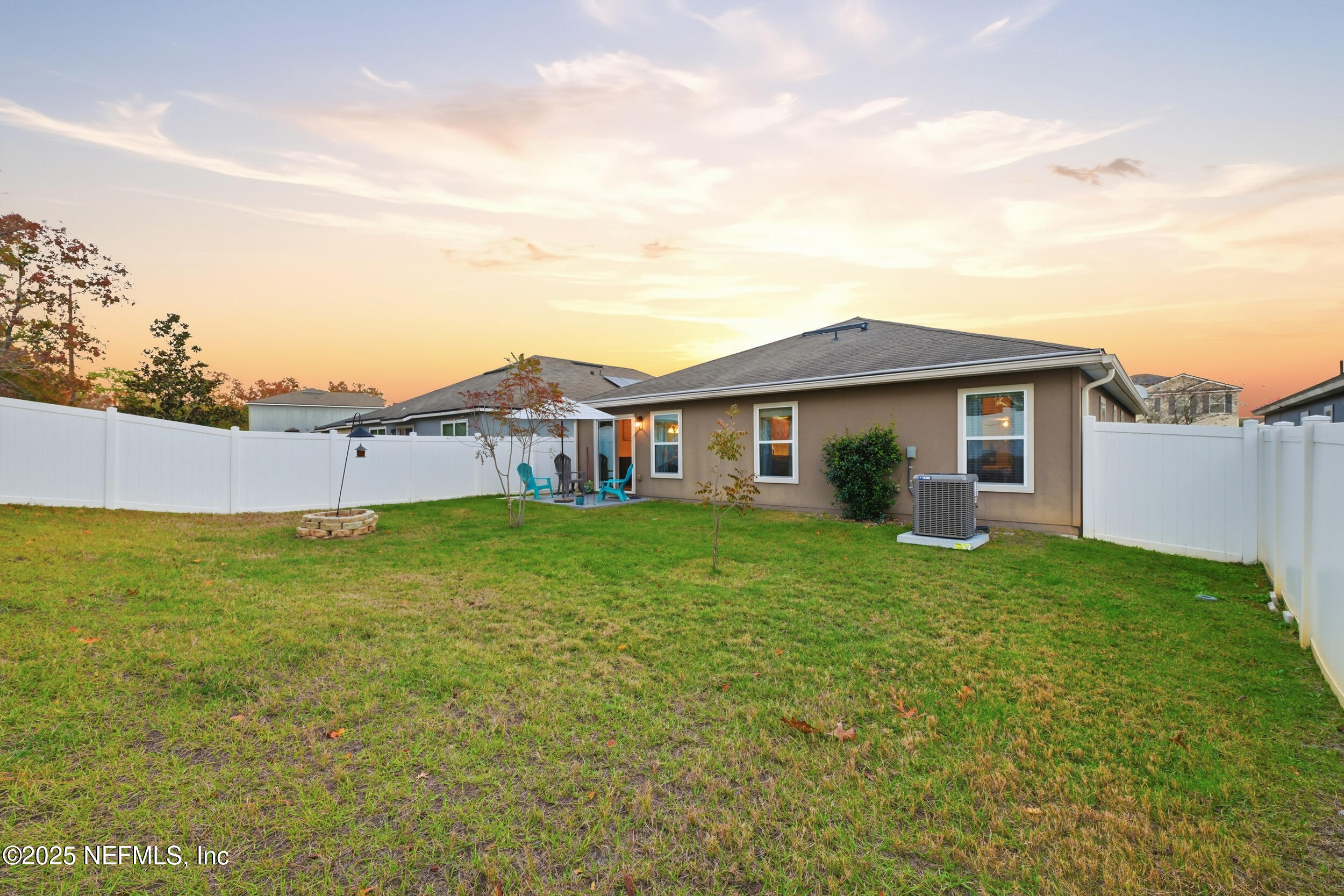 4068 Great Falls Loop Middleburg, FL 32068 - Photo 27 of 36 a view of a house with a backyard